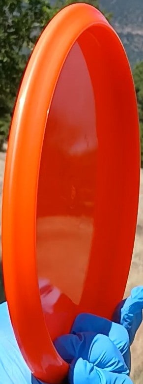 77020310.05 Gold Ice Compass orange disc golf midrange from Dynamic Discs. profile wing view.