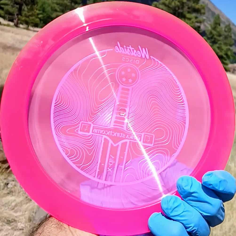77034902.24 VIP Sword Pink Tour Stamp disc golf distance driver from Westsdide Discs. back view