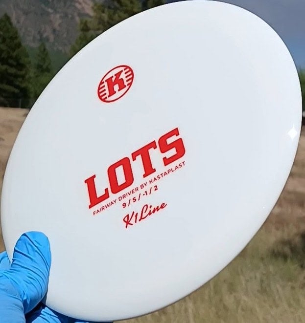 77057101.07 Kastaplast Lots white disc golf fairway driver. front tilt view