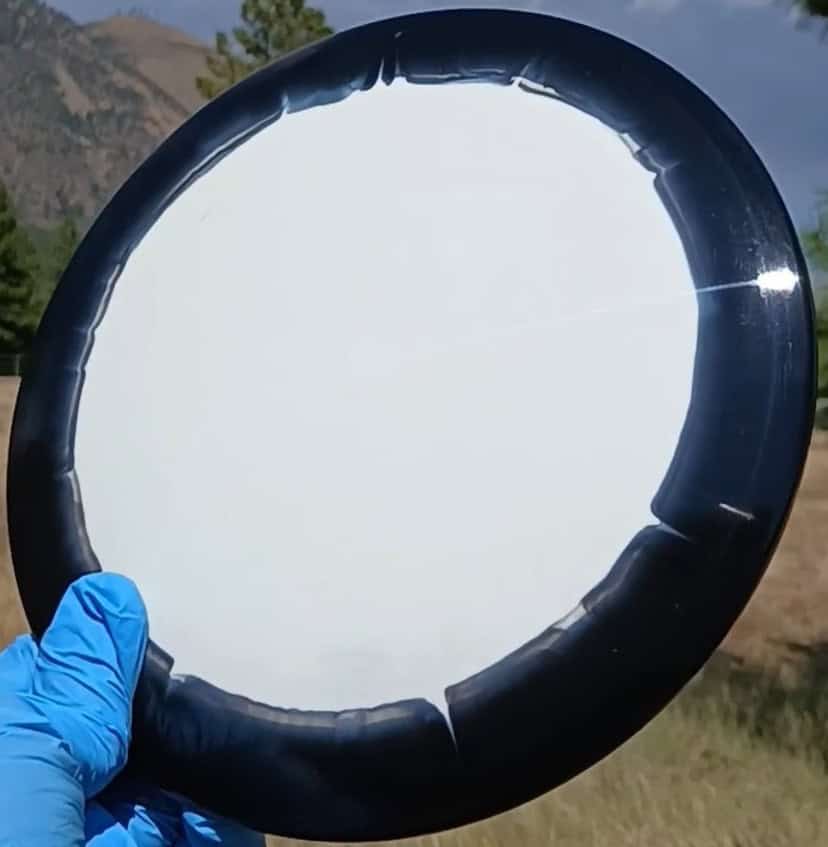88010301.08 Fuzion Fugitive Orbit Blank disc golf midrange Special Edition from Dynamic Discs. front tilt view
