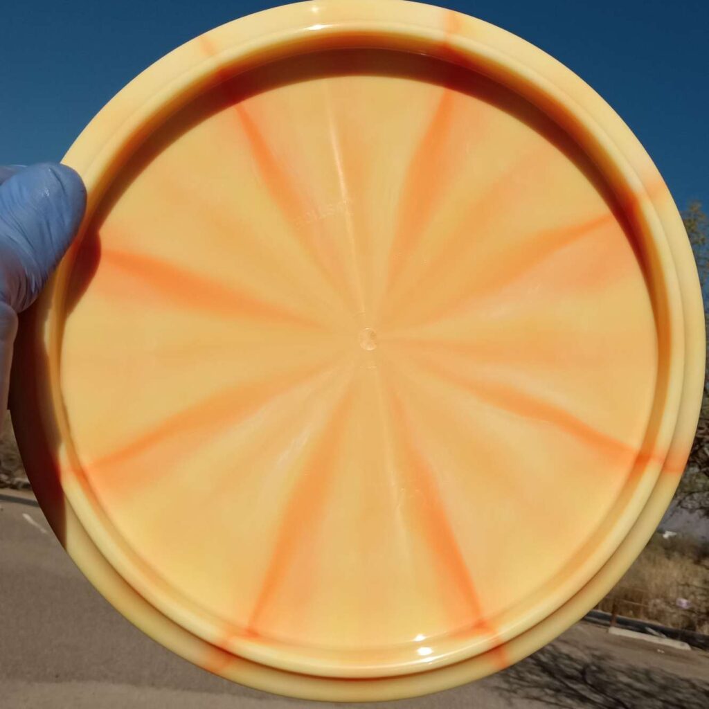 Fuzion Justice Orange Burst Blank Overstable Midrange 176g - Disc Golf Dyes & Design
