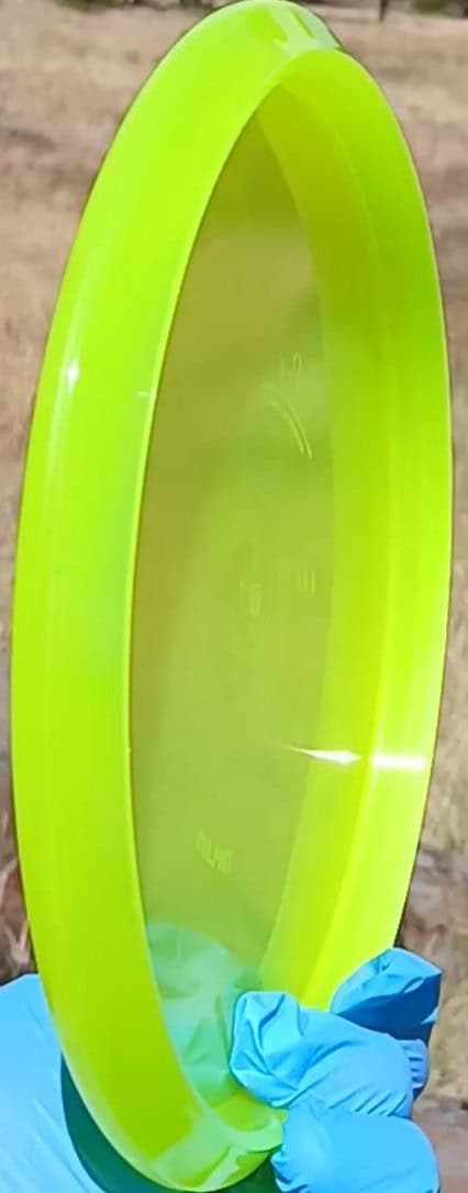 88011210.02 Lucid Ice Culprit yellow Prototype overstable disc golf midrange/putter hybrid from Dynamic Discs. ghost stamp wiped disc profile wing view