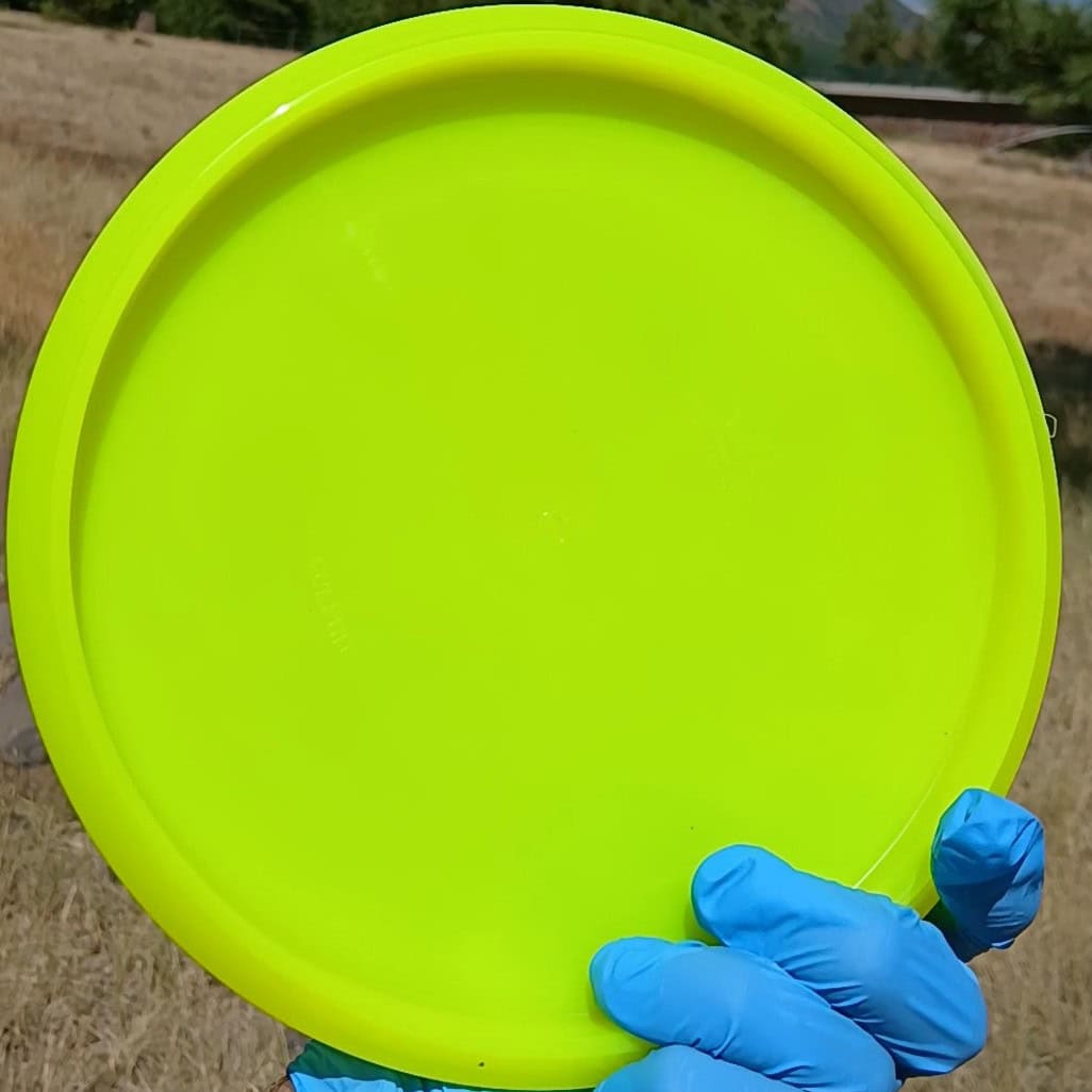 88011210.02 Lucid-X Chris Clemons Culprit yellow overstable midrange from Dynamic Discs. Special Edition wiped ghost stamp. back view