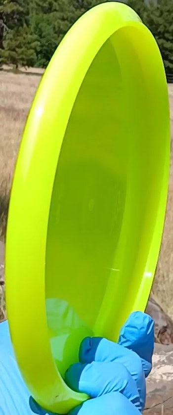 88011210.02 Lucid-X Chris Clemons Culprit yellow overstable midrange from Dynamic Discs. Special Edition wiped ghost stamp. profile wing view