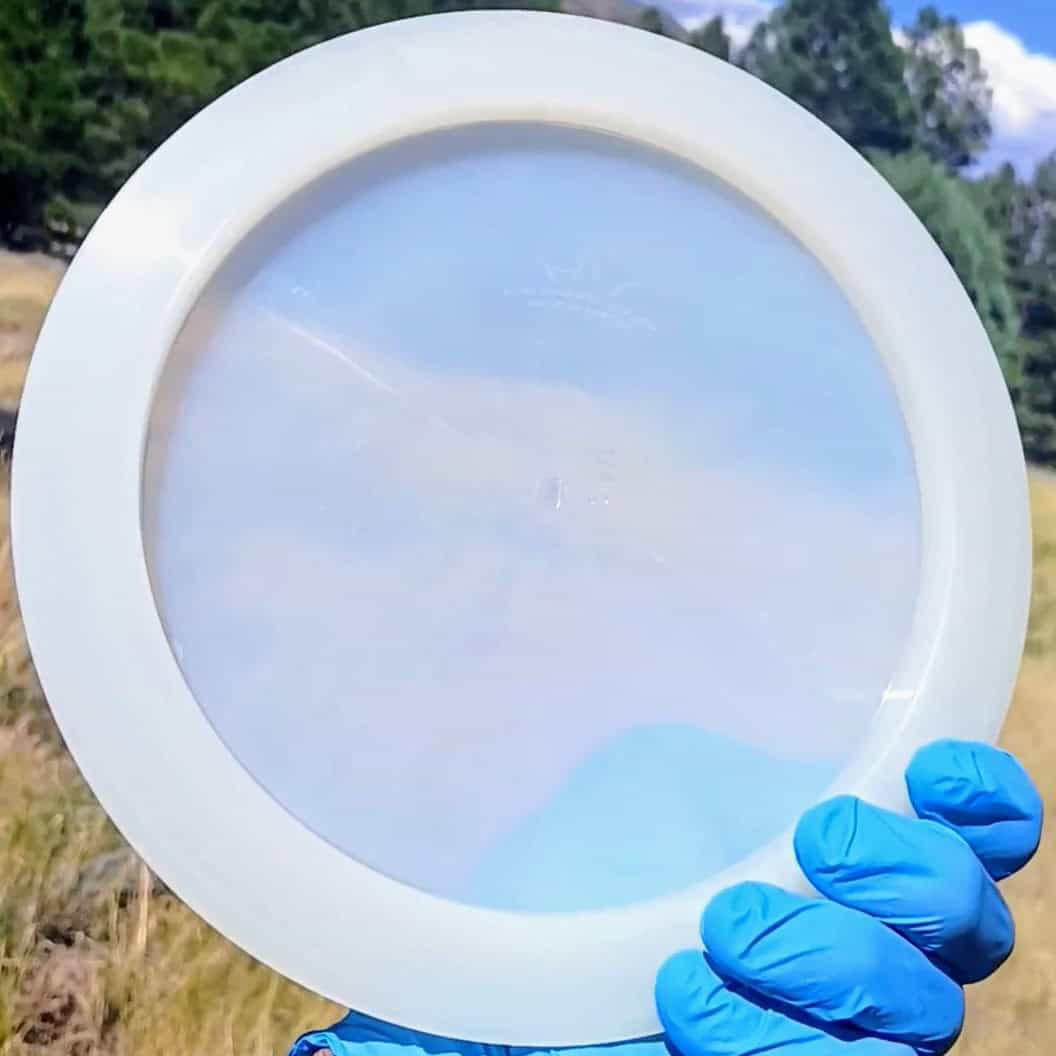 88014210.03 Lucid Ice Defender white blank overstable disc golf distance driver from Dynamic Discs. back view