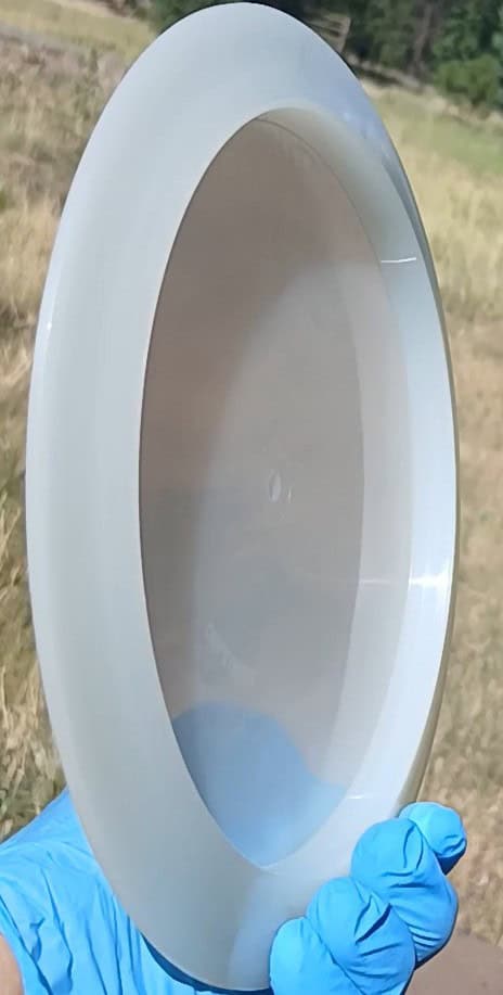 88014210.03 Lucid Ice Defender white blank overstable disc golf distance driver from Dynamic Discs. profile wing view