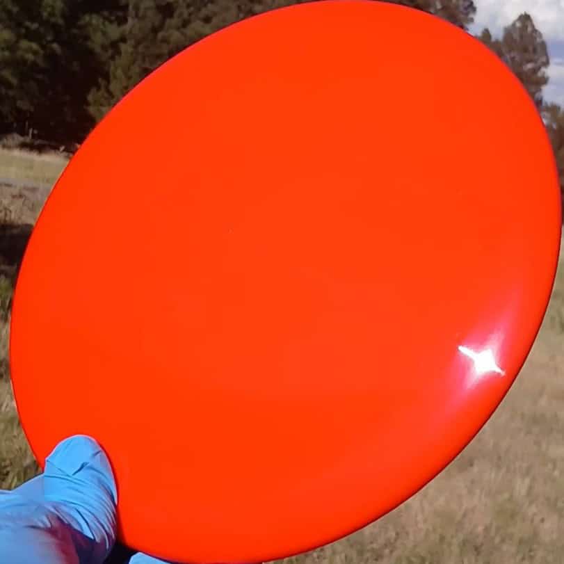 88014701.01 Fuzion Sergeant red blank disc golf distance driver from Dynamic Discs. front tilt view