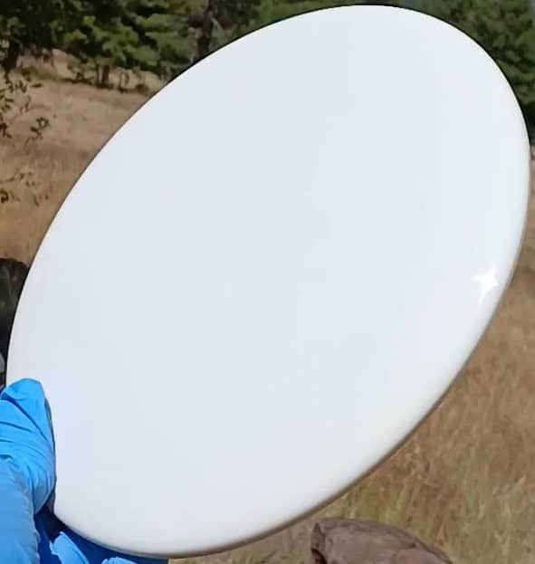 88020205.07 BioGold Claymore white blank disc golf midrange from Latitude 64. front tilt view