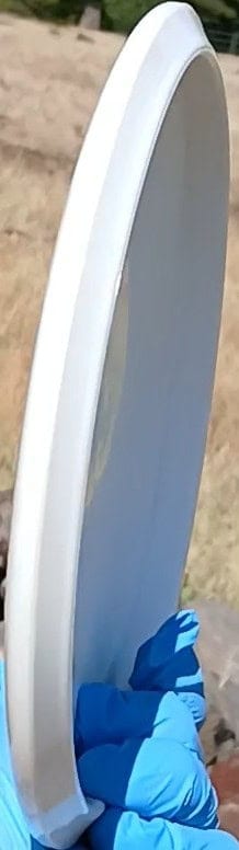 88020205.07 BioGold Claymore white blank disc golf midrange from Latitude 64. profile wing view