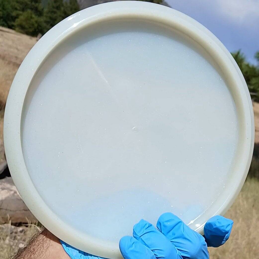 88020302.09 Opto Sparkle Compass white blank disc golf midrange from Latitude 64. back view