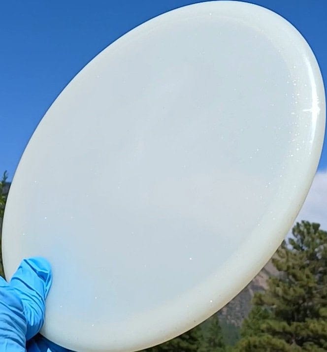 88020302.09 Opto Sparkle Compass white blank disc golf midrange from Latitude 64. front tilt view