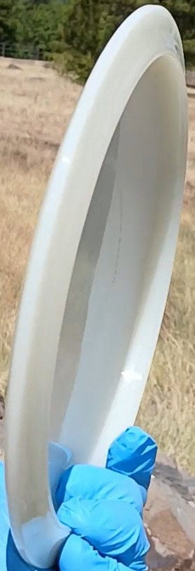 88028002.07 Opto River white bIank understable disc golf fairway driver from Latitude 64. profile wing view