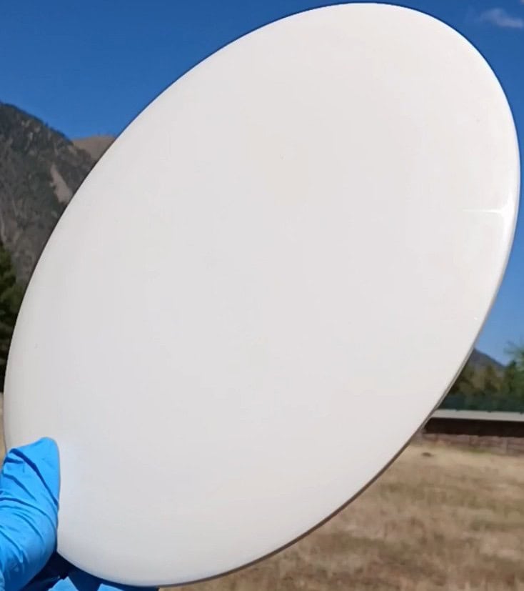 88034401.07 Tournament Giant white blank overstable disc golf distance driver from Westside Discs. front tilt view