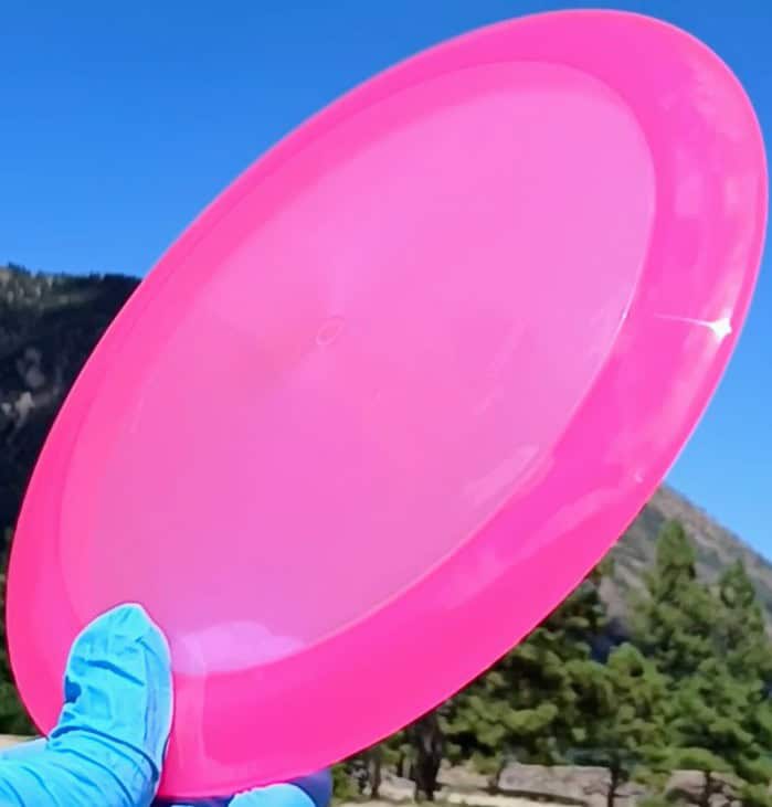 88034702.04 VIP Queen pink blank understable disc golf distance driver from Westside Discs. front tilt view