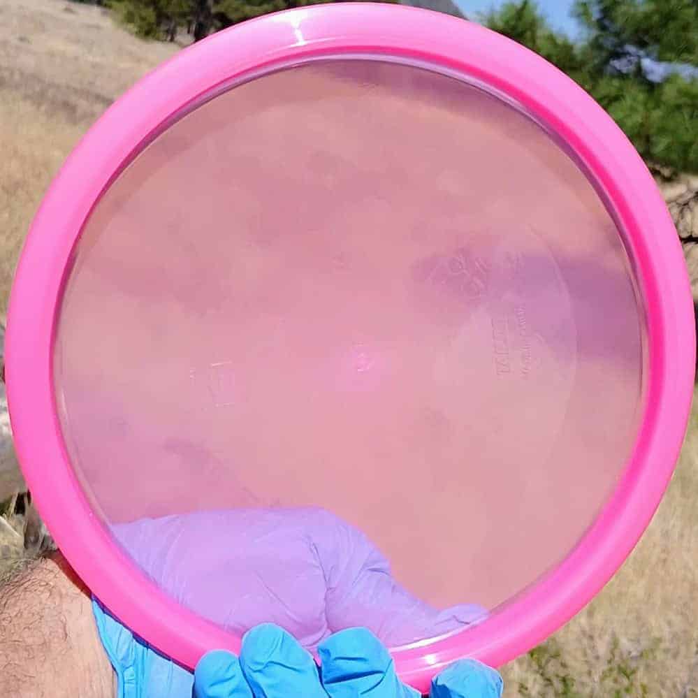 88040101.08 Active Premium Tailor pink wiped overstable disc golf midrange from Discmania. back view