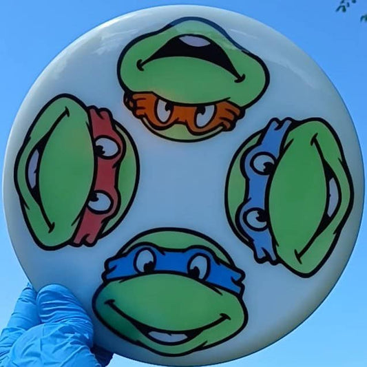 012602.01 Lucid emac truth Ninja Turtles disc golf midrange front 