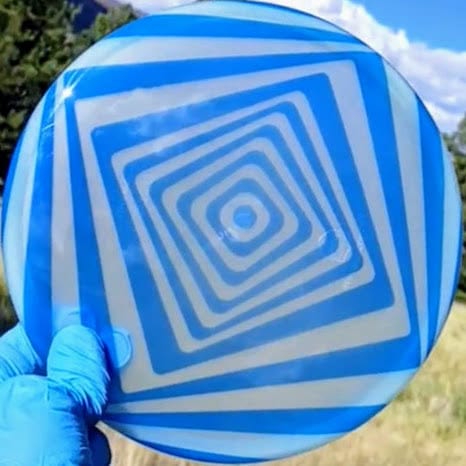 042503.01 Sensei Glow Spiral Square front cloud reflections