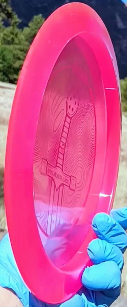77034902.24 VIP Sword Pink Tour Stamp disc golf distance driver from Westsdide Discs. profile wing view
