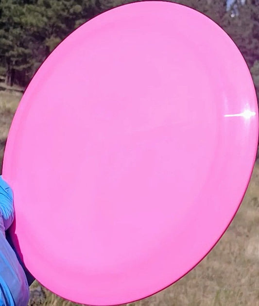 88014501.04 Fuzion Raider pink blank  disc golf distance driver from Dynamic Discs. front tilt view