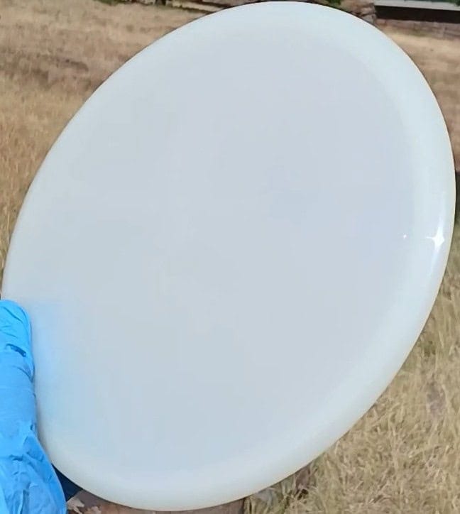 88020302.07 Opto Compass white blank disc golf midrange from Latitude 64. front tilt view
