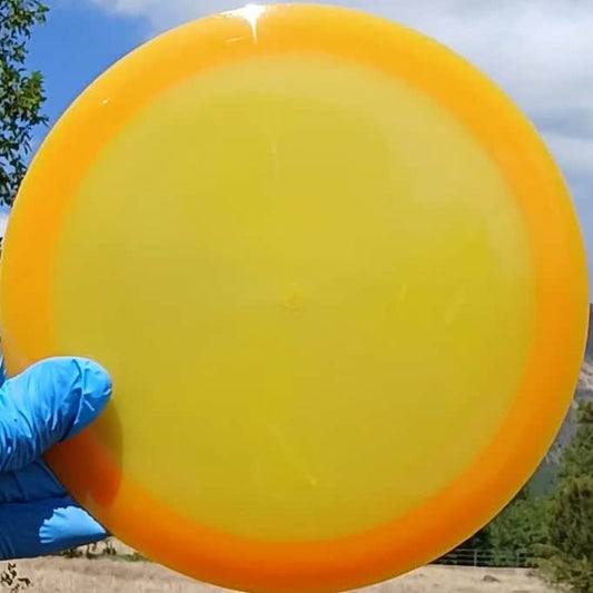 88037703.05 VIP Air Northman orange blank lightweight disc golf distance driver from Westside Discs. front view