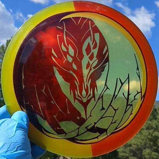 Discmania Active Premium Mentor Smaug Dragon yellow and red custom dyed disc golf distance driver front view