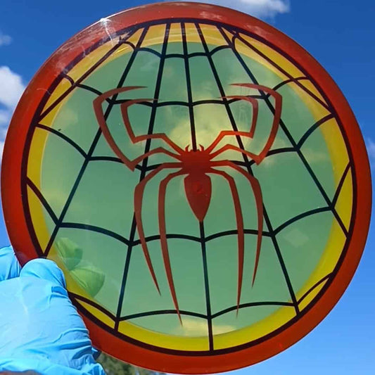 Discmania Active Premium Mentor Spiderman yellow custom dyed disc golf distance driver front view