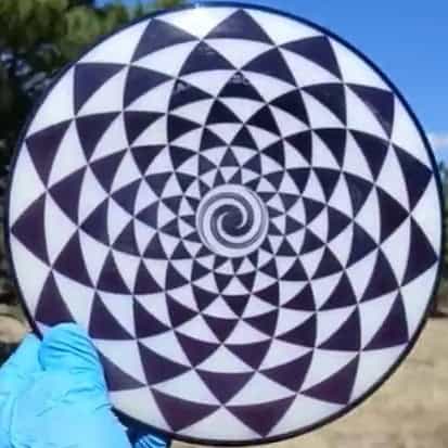 Dynamic Discs Lucid Enforcer Penny Flower Spiral disc golf distance driver front view - Custom Dyed Discs