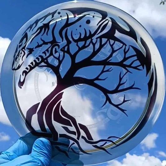 Dynamic Discs Lucid Ice Escape Spirit Wolf custom dyed disc golf fairway driver front sky view.