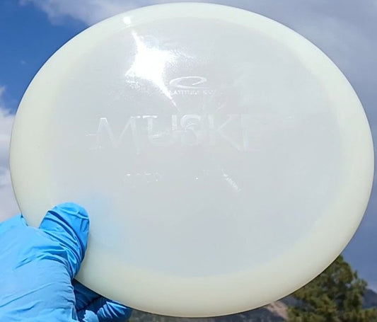 Latitude 64 Opto Musket white wped disc golf fairway driver front view ghost stamp - Custom Dyed Discs