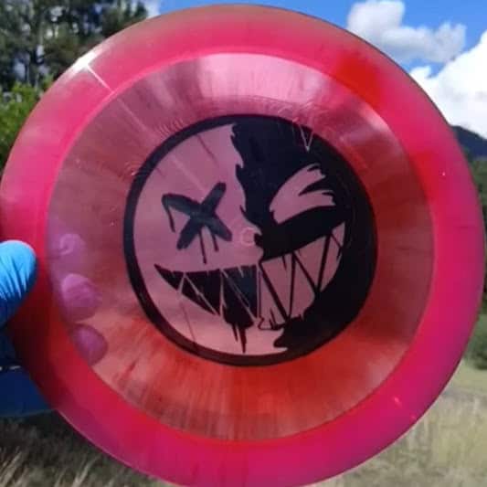 Westside Discs VIP-X Sword Crazy Smiley disc golf distance driver front view - Custom Dyed Discs 