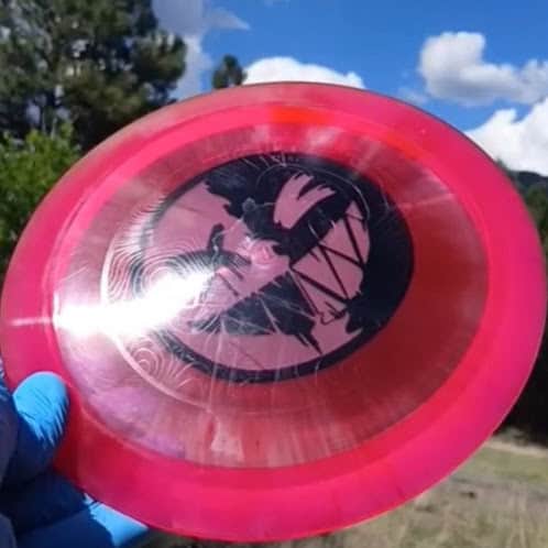 Westside Discs VIP-X Sword Crazy Smiley disc golf distance driver front view - Custom Dyed Discs ghost stamp reflection