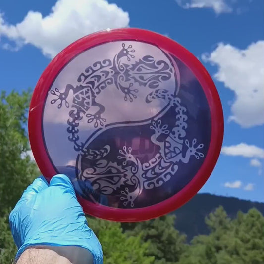 040802.04 Premium Tailor Yin Yanguana disc golf midrange from Discmania. Gecko design ghost stamp.