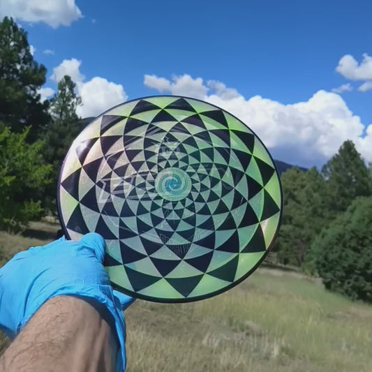 017402.04 Lucid Sparkle Felon Penny Flower black floral geometric disc golf design on yellow Ricky Wysocki SOCKIBOMB metallic flake Felon from Dynamic Discs.