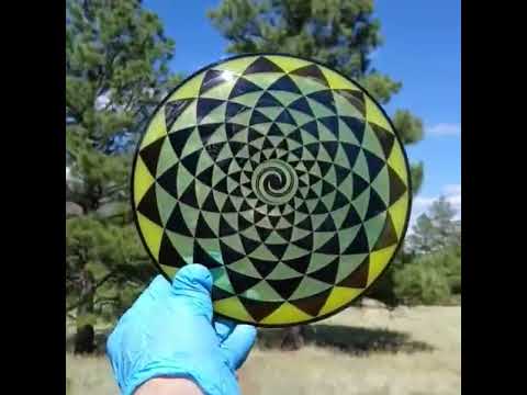 047502.26 Premium Genius Penny Flower Spiral yellow and black geometric design floral pattern disc golf fairway driver from Discmania.