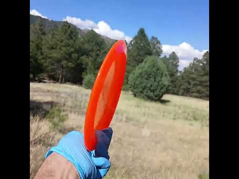 77017410.25 Lucid Ice Trespass orange disc golf distance driver from Dynamic Discs.