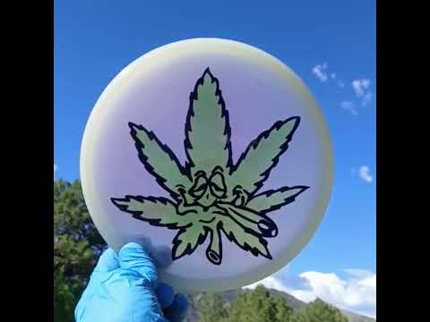 042503.09 Sensei Glow Cannabis Carl ghost stamp glow-in-the-dark disc golf putter from Discmania